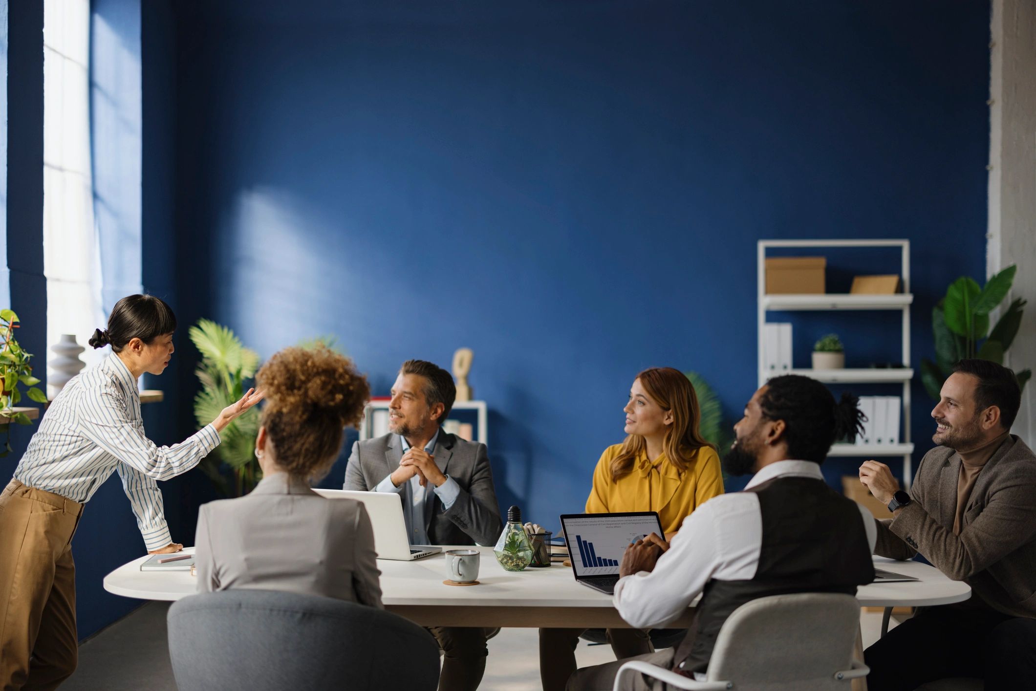 Leadership team collaborating in a modern office